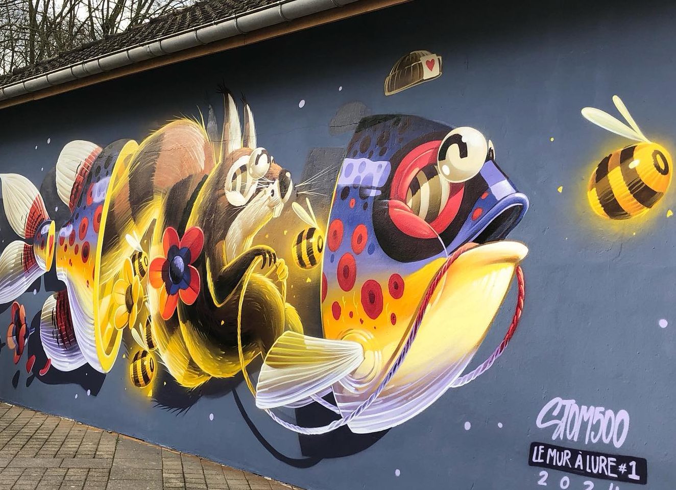 Œuvre de street art réalisée par Stom500 sur le M.u.r à Lure - réalisé par Stom - Vosges du Sud